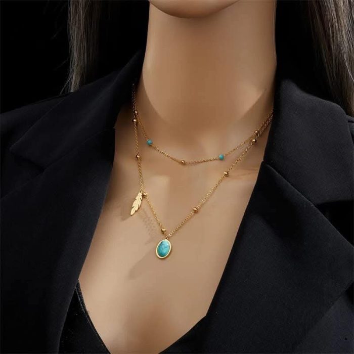 Collier plume turquoise